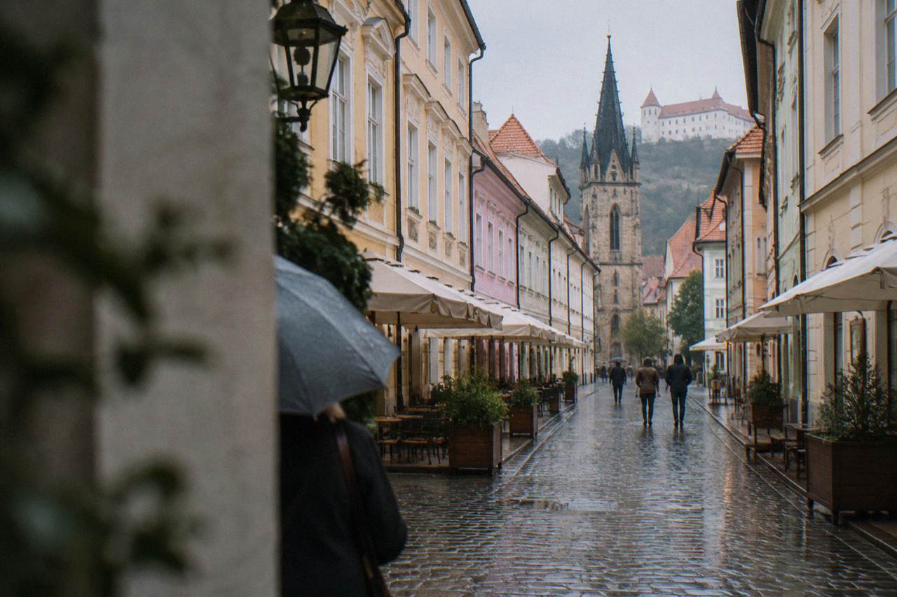 Pastel-coloured historic buildings on a narrow street in Bratislava's Old Town