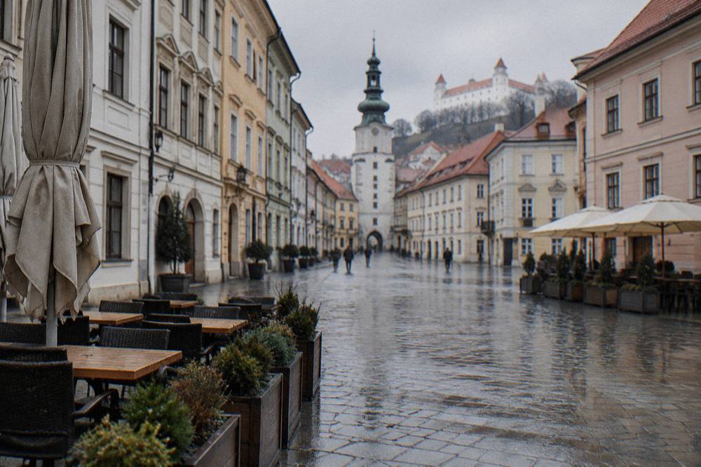 Empty paved square in Bratislava Old Town on a cold overcast day