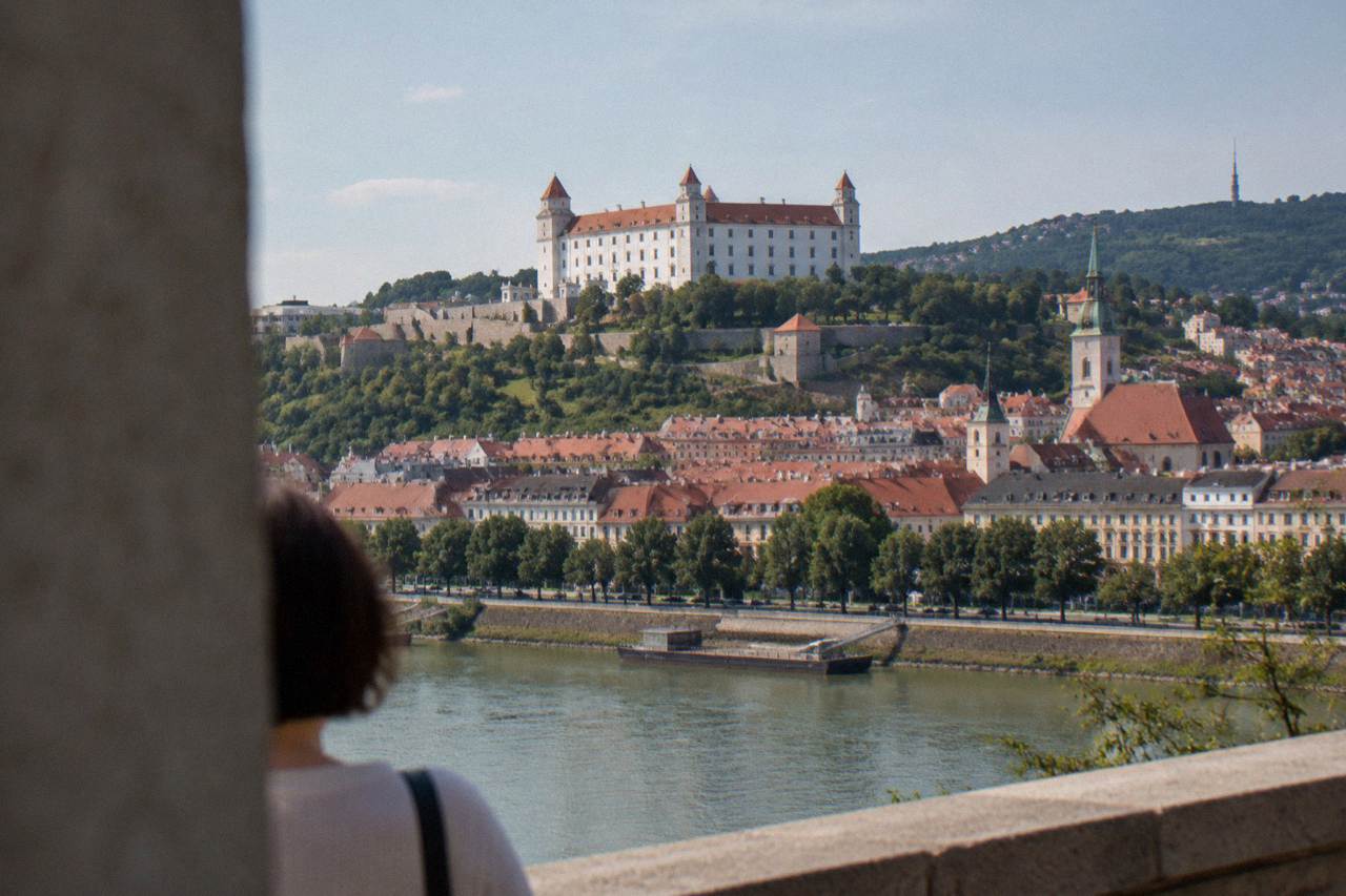 Bratislava Castle on its hill above the red rooftops of the Old Town and the Danube