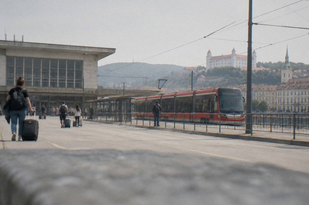 A tram moving along a street near Bratislava main railway station