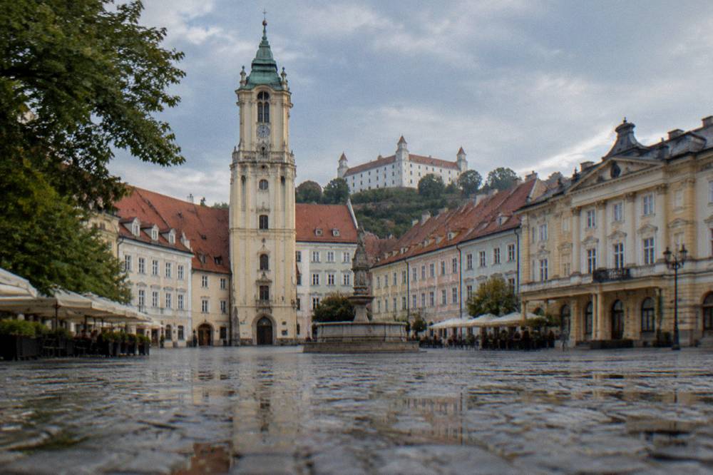 Tree-lined Hviezdoslavovo square with the Reduta concert hall facade in Bratislava