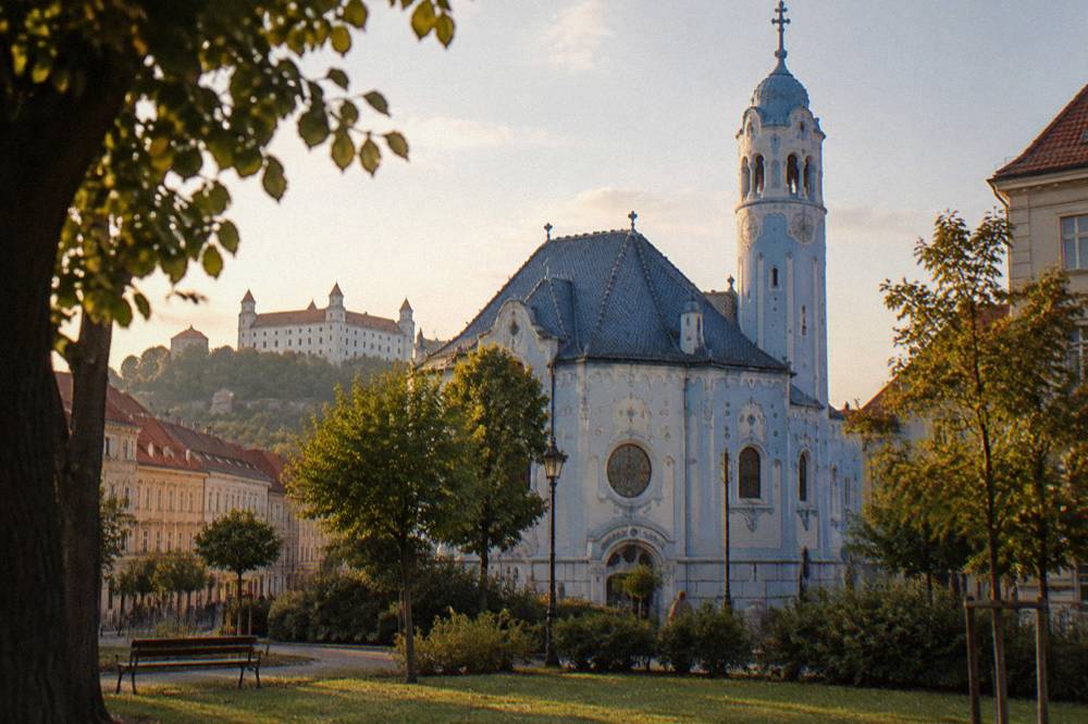 The Blue Church seen across the small green space in front of its facade