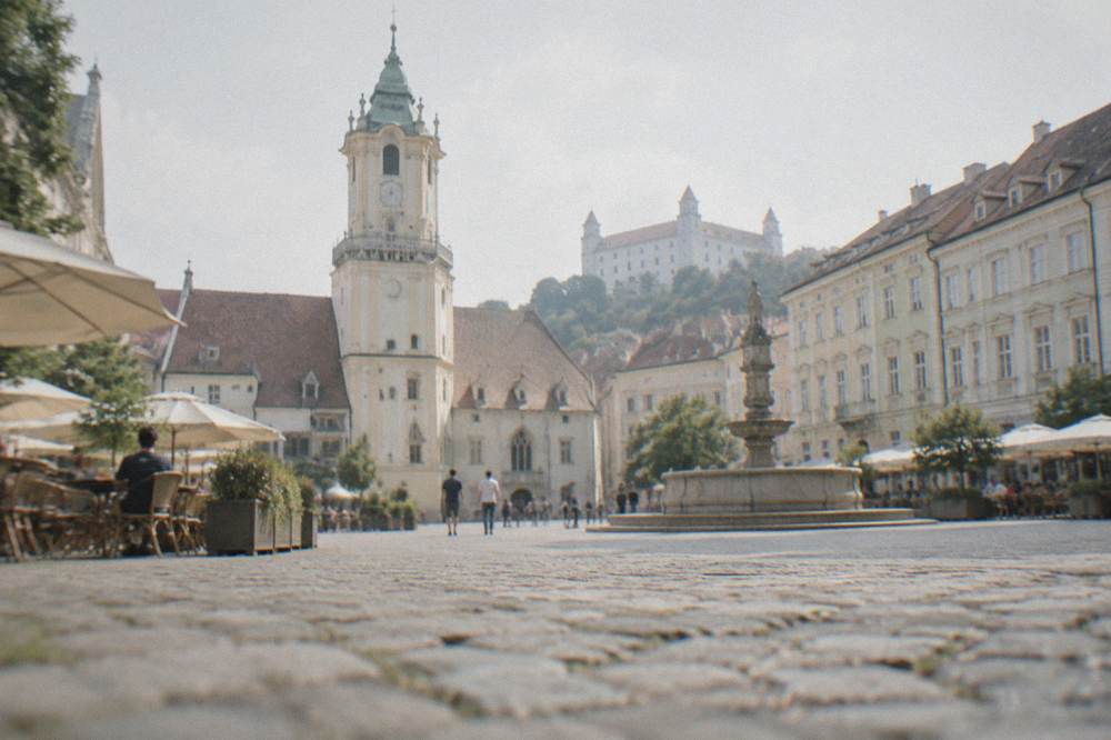 The Main Square in Bratislava with the Old Town Hall and outdoor tables