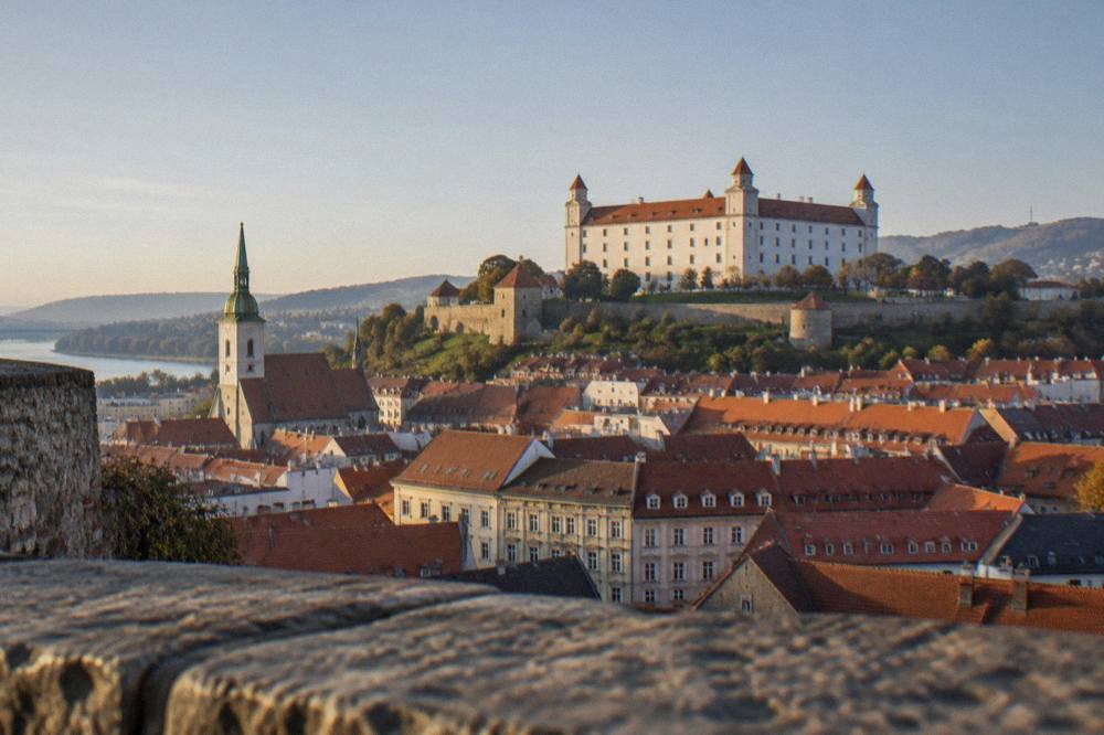 Bratislava Castle seen above the red rooftops of the Old Town