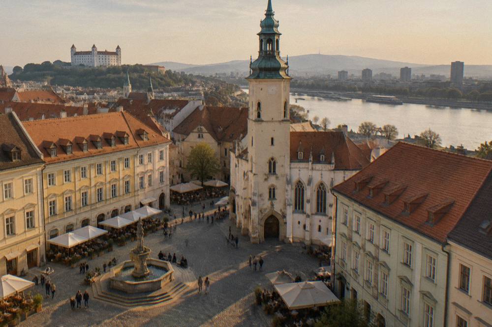 Riverside promenade with modern buildings along the Danube in Bratislava