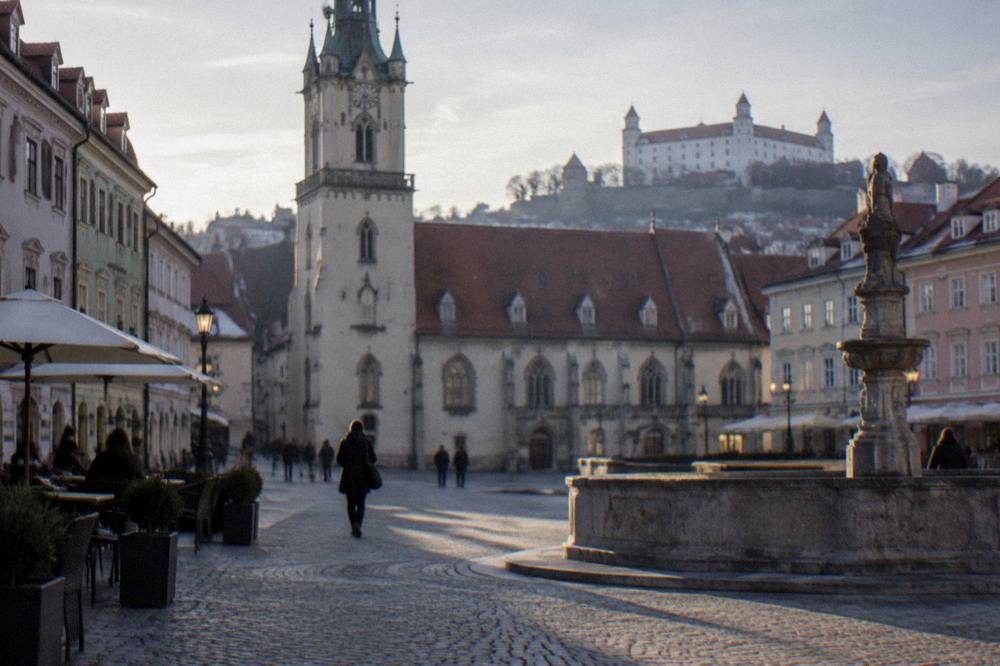 Evening light on a palace facade and street lamps in Bratislava