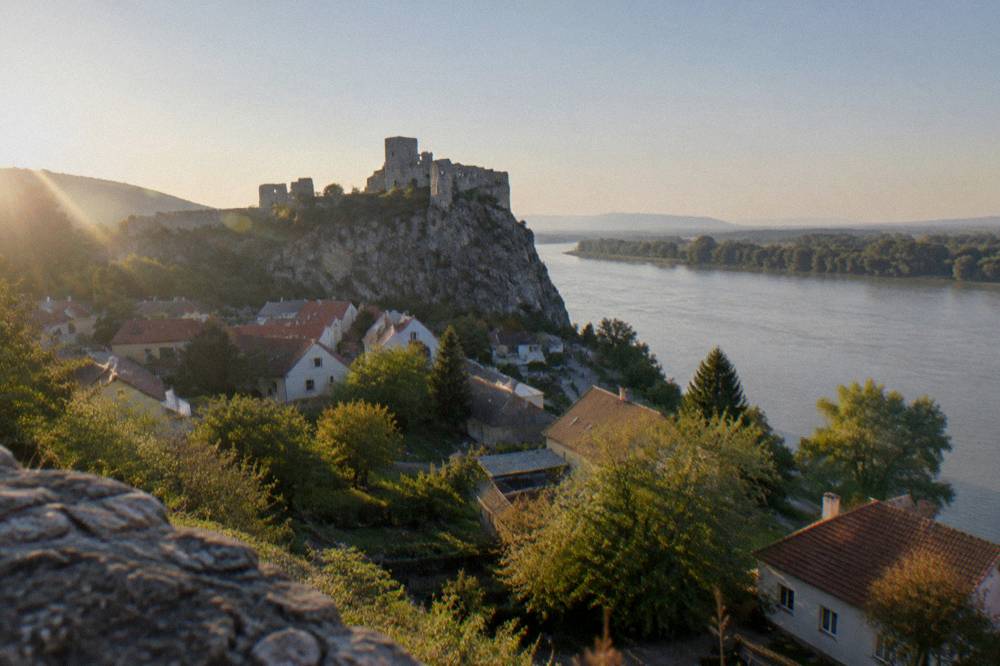 Castle on a hill above a river at Devin near Bratislava under a clear sky
