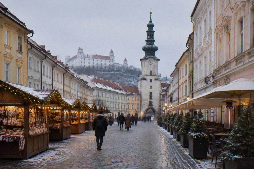 Festive stall lights along a square in Bratislava's Old Town