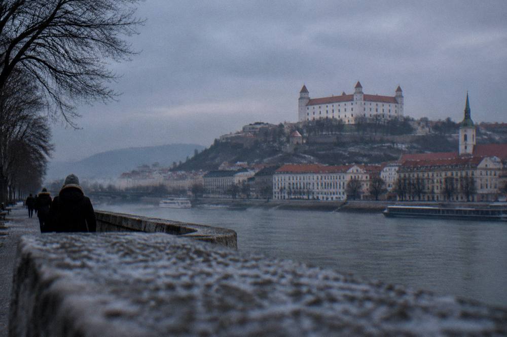 Bratislava Castle on its hill above the city under a winter sky