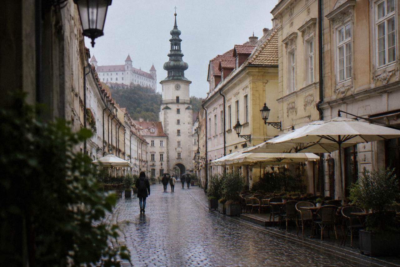 A street sign on a corner building in Bratislava's Old Town with Slovak text