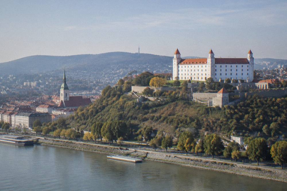Morning light over Bratislava Castle on its hill above the Danube riverfront
