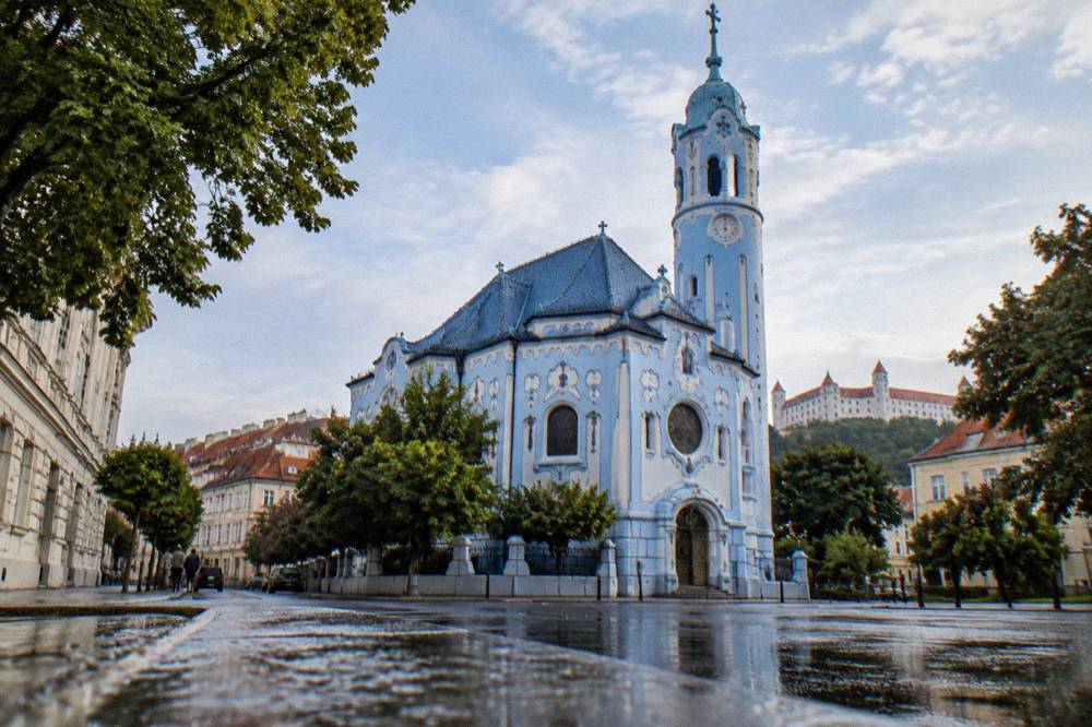 Colourful Blue Church facade in Bratislava seen from the street