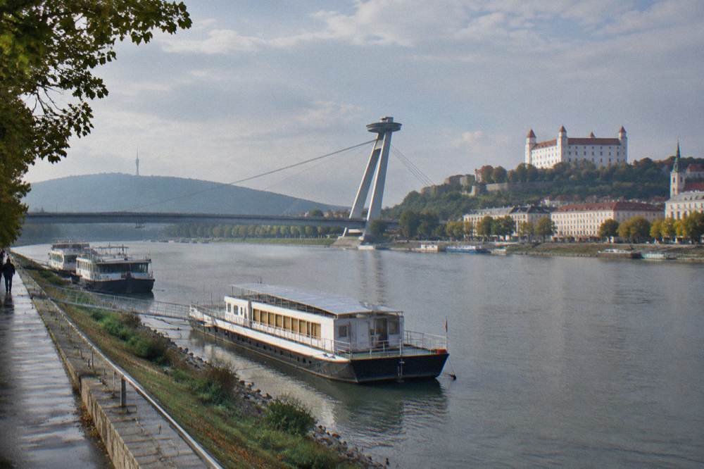 Boats moored on the Danube near the UFO bridge in Bratislava