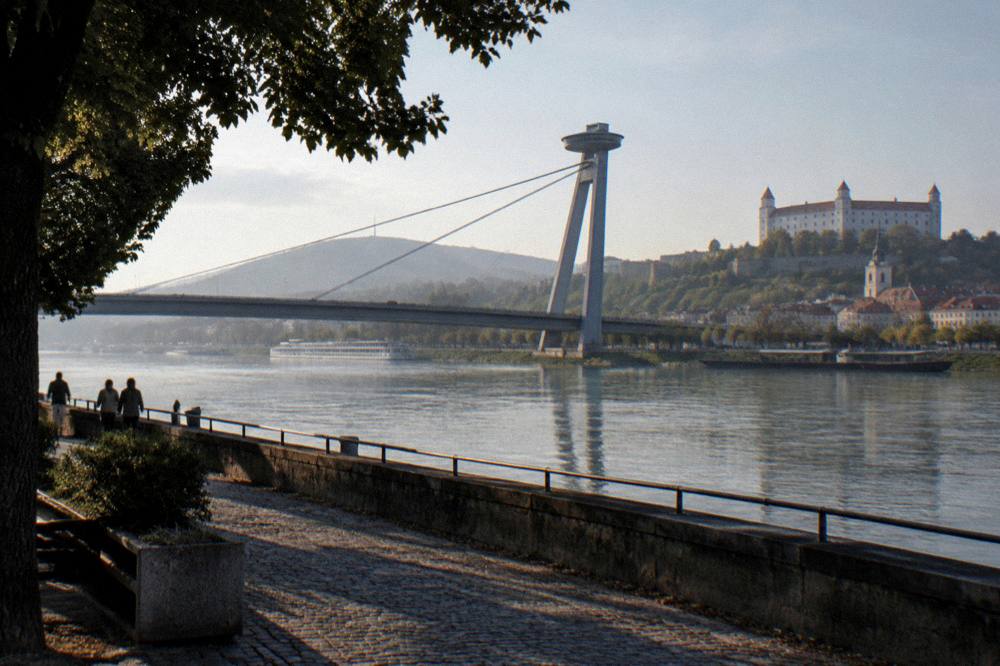 The Danube riverfront and UFO bridge deck seen from the Bratislava side