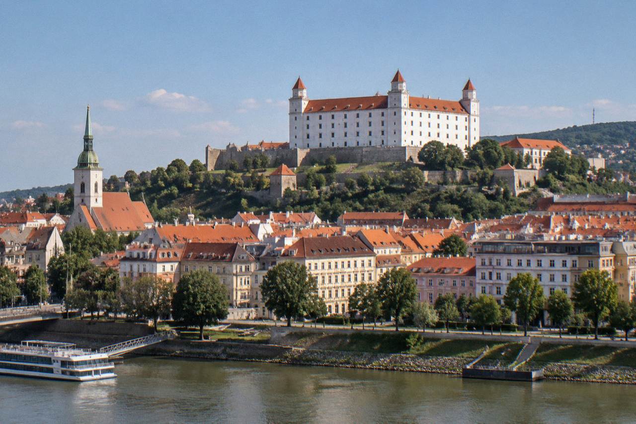 Bratislava Castle standing above the old town rooftops on a clear afternoon