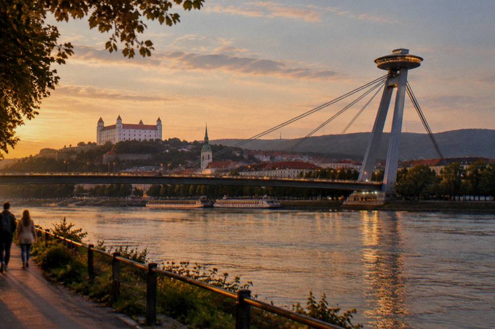 The illuminated UFO observation deck on the Most SNP bridge at night above the Danube