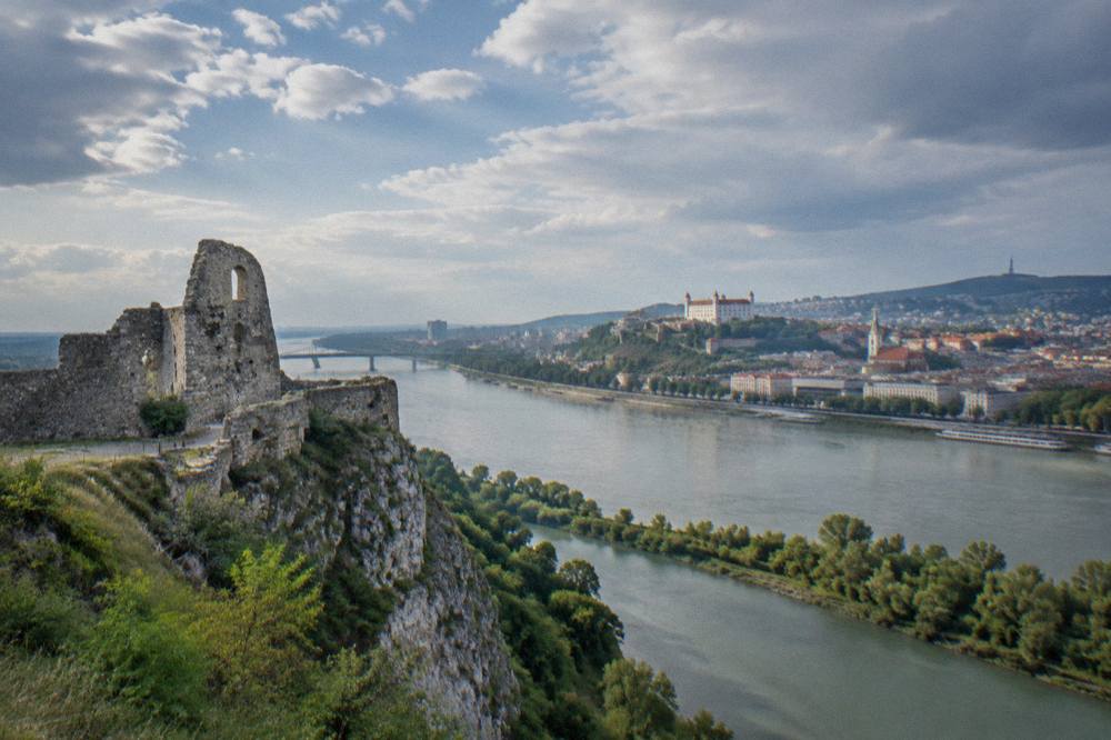 The stone walls of Devin Castle above the river at the city's western edge