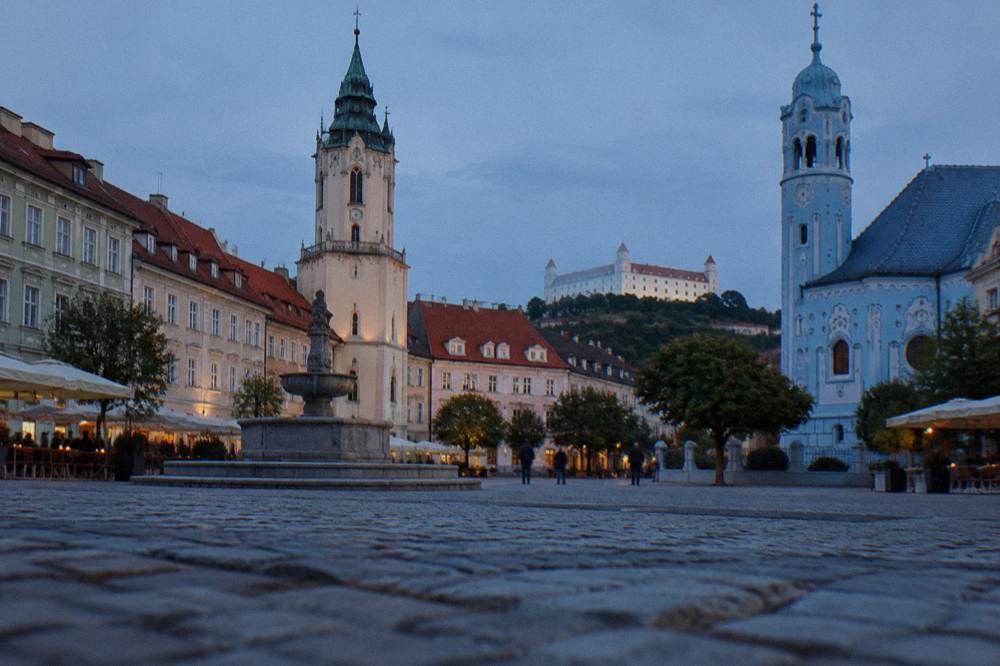 The blue facade of the Church of St Elizabeth in Bratislava seen from the street