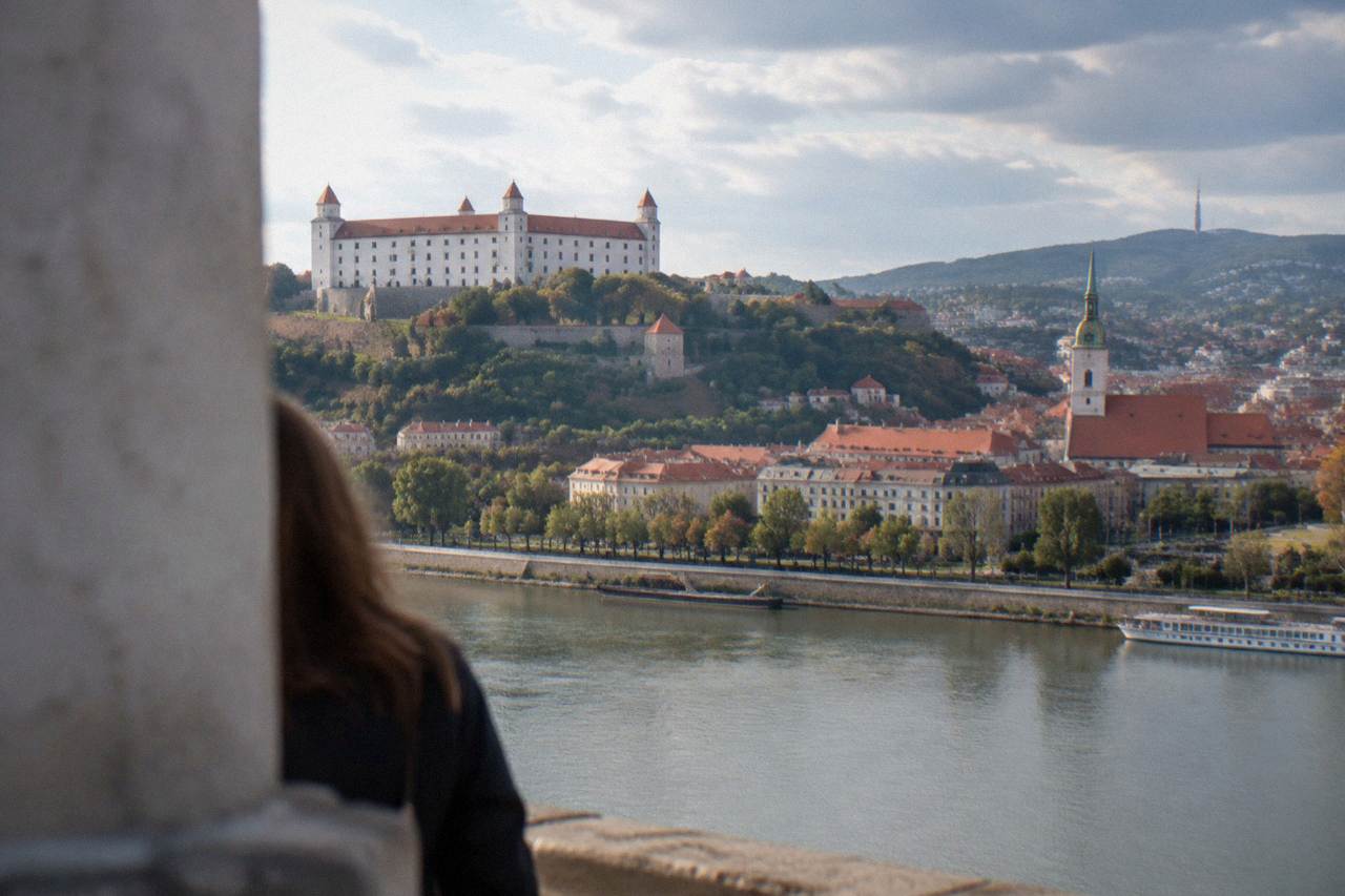 The Danube river and Bratislava Castle on its hill above the Old Town rooftops
