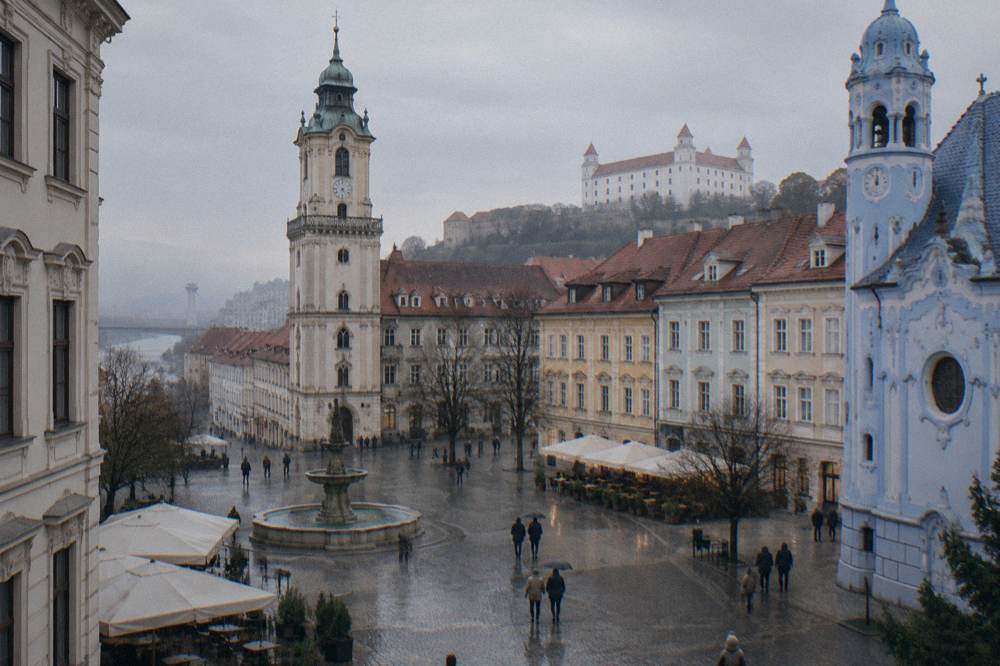 The Blue Church's pale blue facade seen from the street in Bratislava